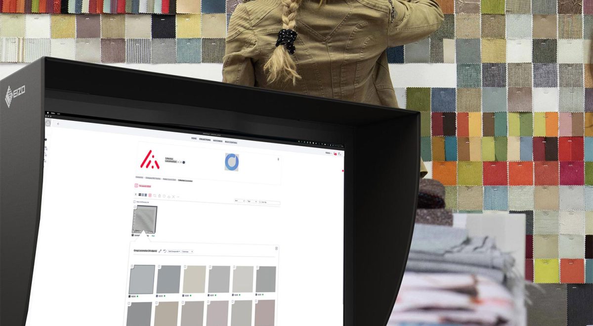 DMIx interface with color library in front of Bru's fabric swatch wall